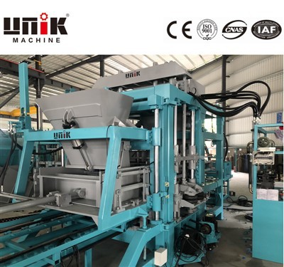 Helautomatisk tegelmaskin