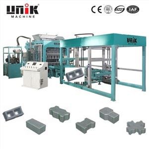 Hydraulisk beläggningsblocksmaskin
